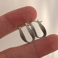 Twist Winding Geometrische Ohrringe | Shop Nory