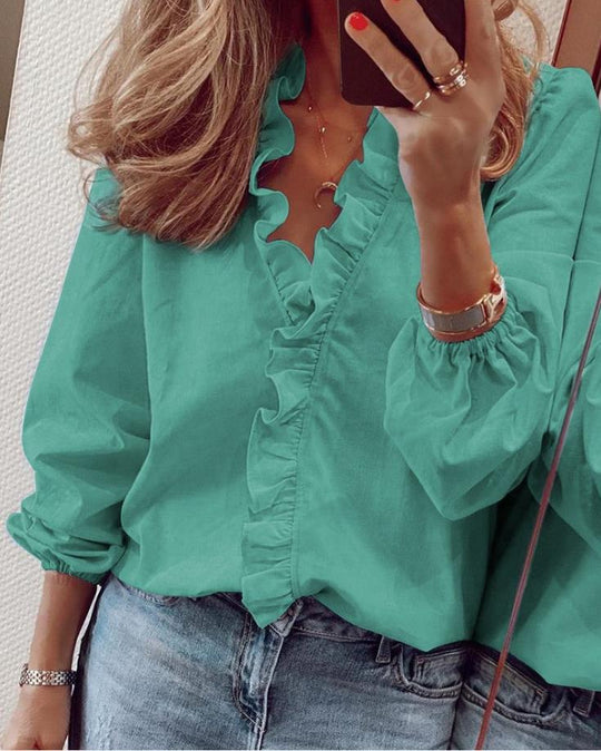 Bluse mit Rüschen und V-Ausschnitt