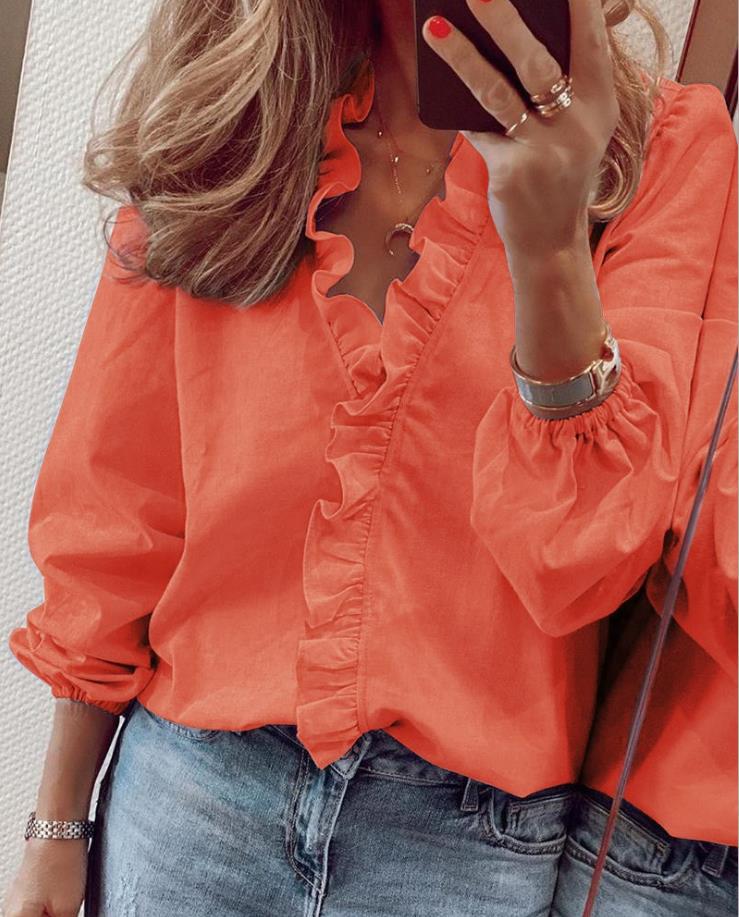 Bluse mit Rüschen und V-Ausschnitt